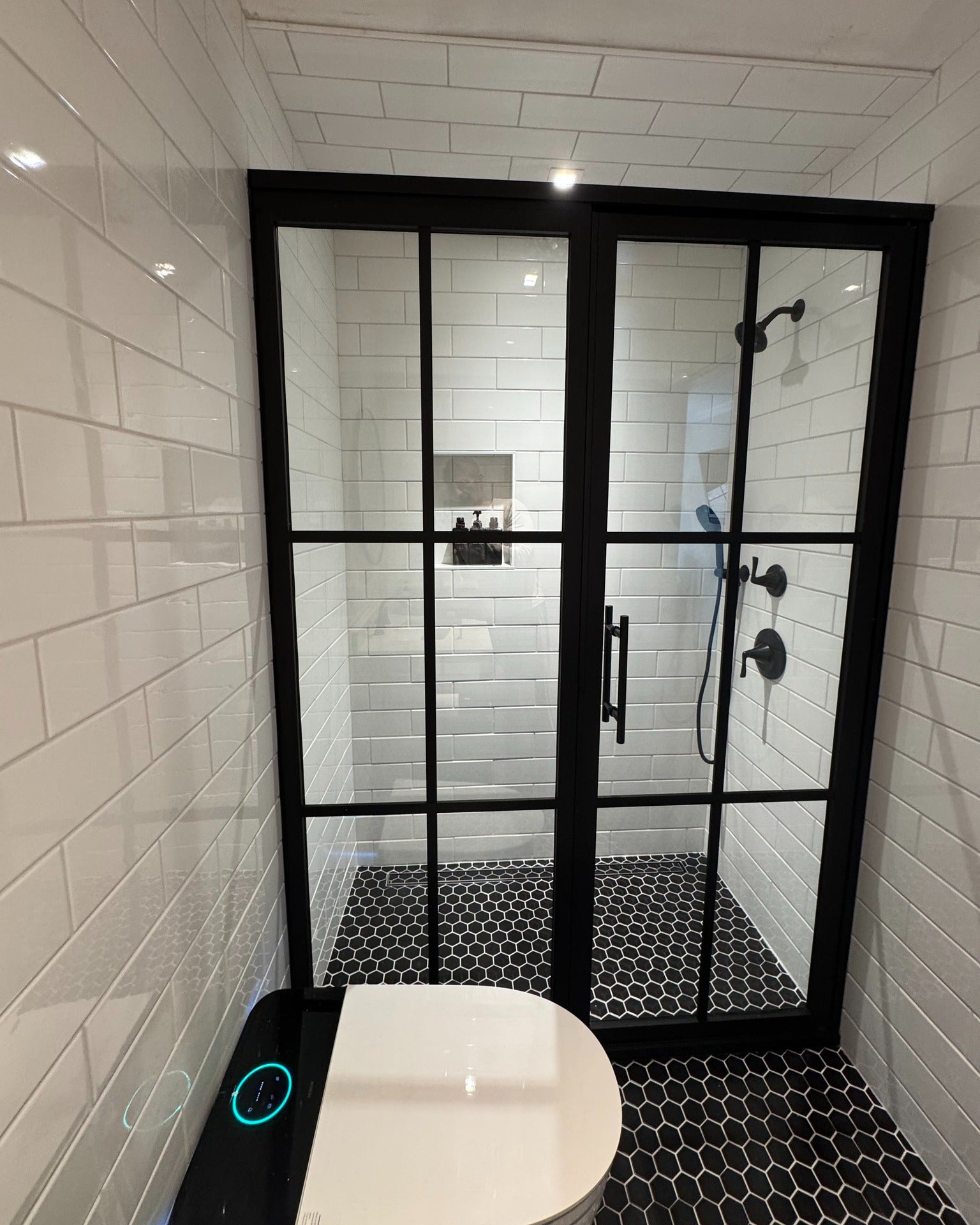 Gridscape GS1.2 Swing Shower Door and Panel in Black Clear Glass