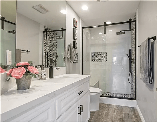 Eclipse Frameless Sliding Barn Door Shower Door in Black with Clear Glass