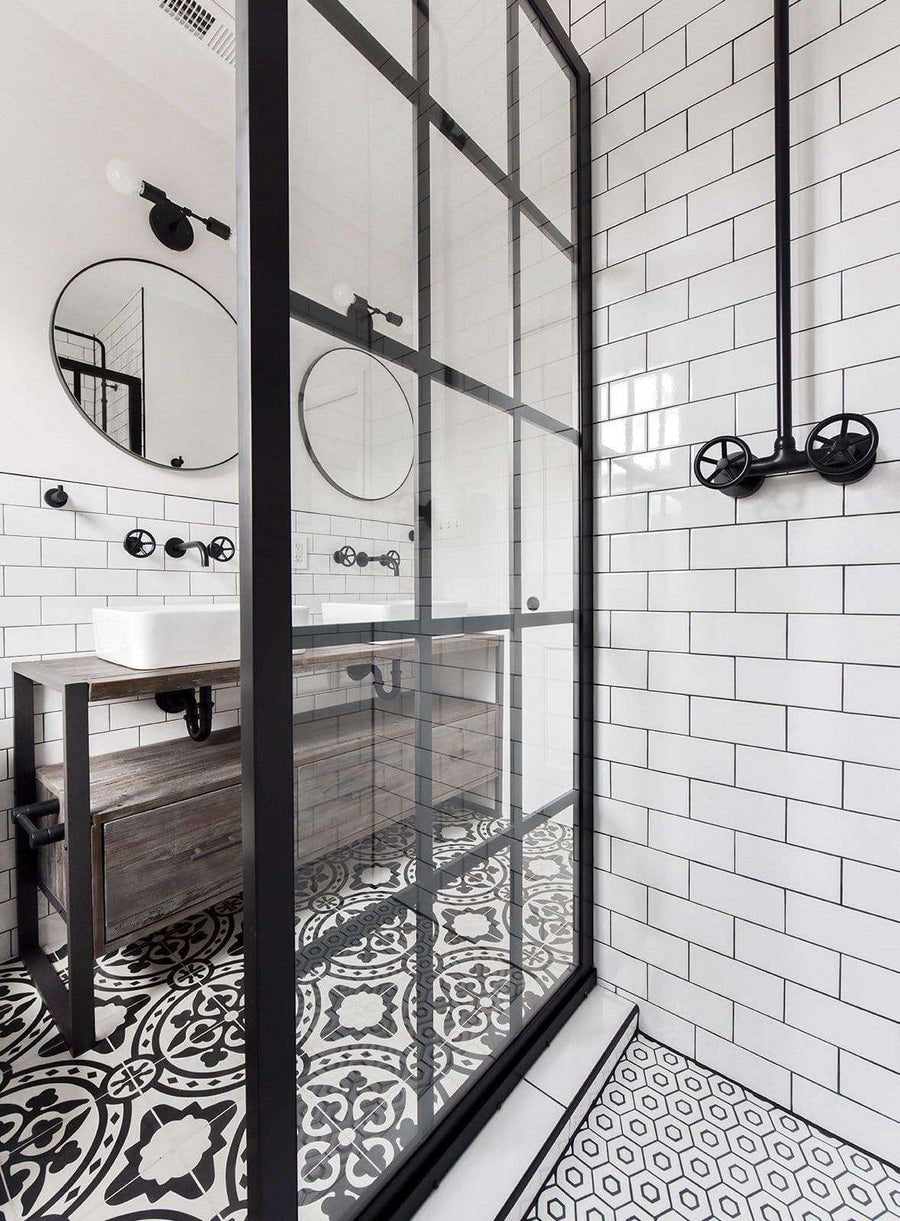Mullions on Outside of Glass Panel This Gridscape Shower Panel Features an Industrial Style Black Frame